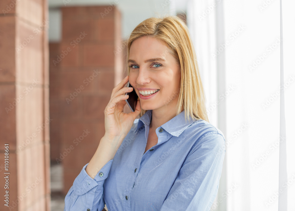 Beautiful young woman in office hall Beautiful young woman in office hall