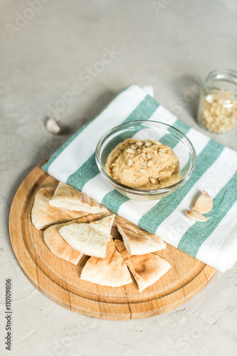 Healthy Homemade Creamy Hummus with Olive Oil and pitta