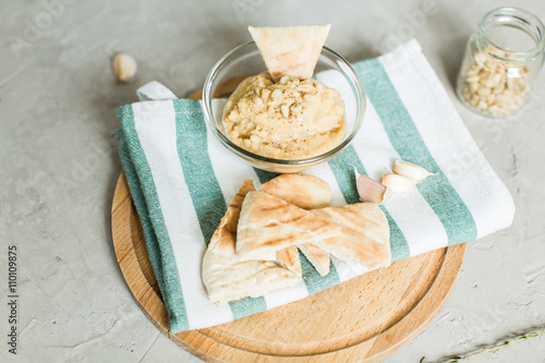 Healthy Homemade Creamy Hummus with Olive Oil and pitta