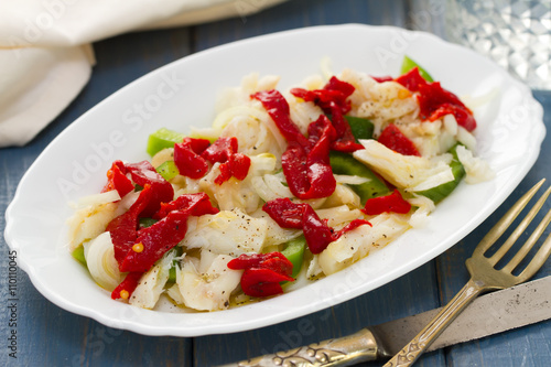 fish with pepper on white dish