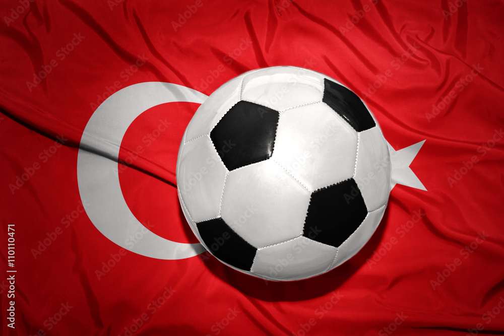 black and white football ball on the national flag of turkey black and white football ball on the national flag of turkey