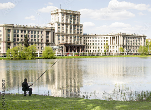 Fishing in the pond in the Lefortovo Park. Moscow photo