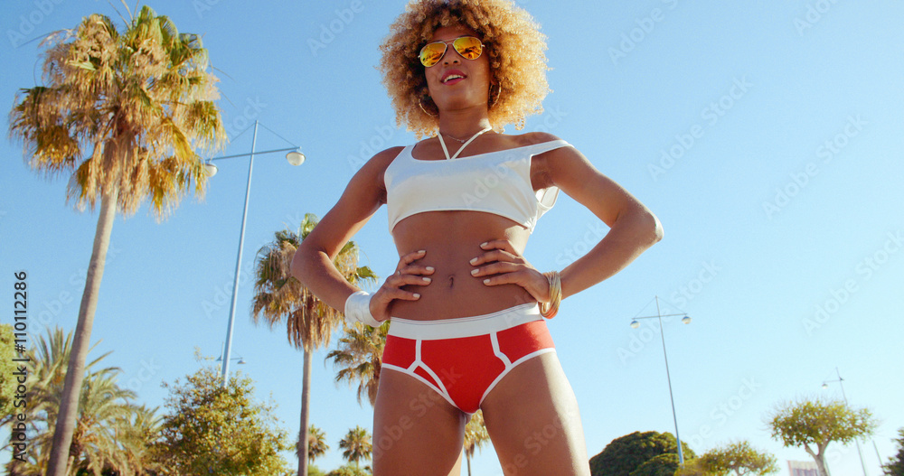 Retro Stylized Sexy Afro American Girl Standing With Hands on Hips. She  Wearing Red Panties Shirt and Sunglasses. Slow Motion Video Stock Photo |  Adobe Stock