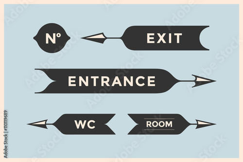 Set of vintage arrows and banners with inscription Entrance, Exit, Room and WC. Design elements in retro style for navigation sign on color background. Vector Illustration