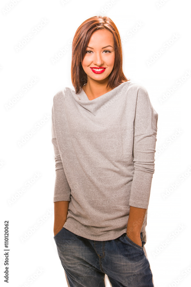 Fototapeta premium Beautiful happy young woman standing with hands in pockets.