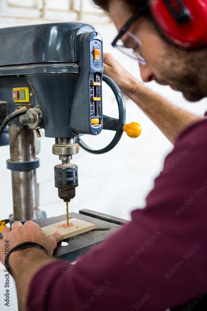 Carpenter working on his craft Carpenter working on his craft