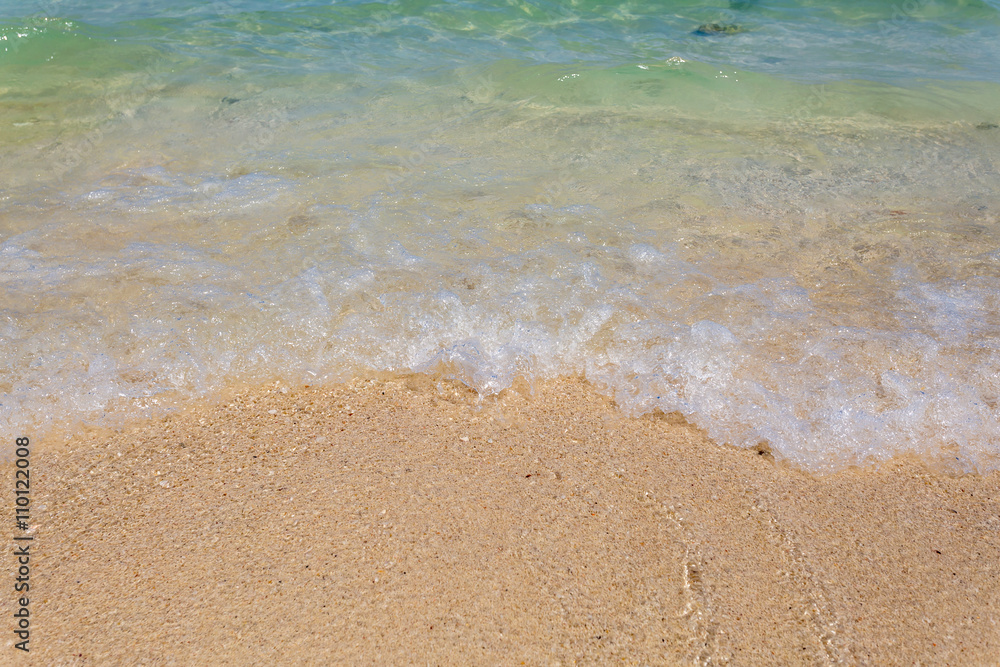 wave of the sea on sand beach