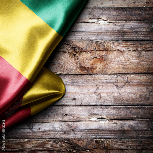 Flag of Guinea on wooden boards