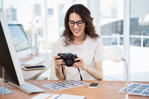Photography A woman is watching photos