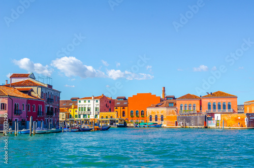 Fotografiet view of typical buildings of murano island near venice viewed from deck of a ferry
