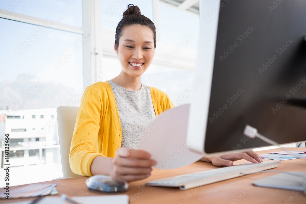 A businesswoman is working at her desk A businesswoman is working at her desk