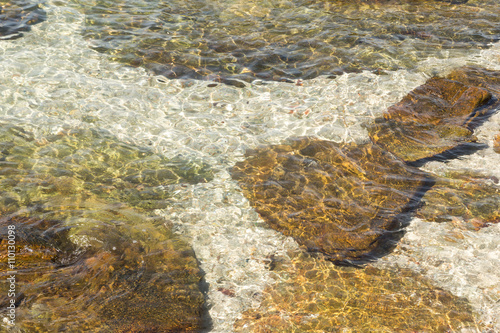 surface of sea with stones. photo