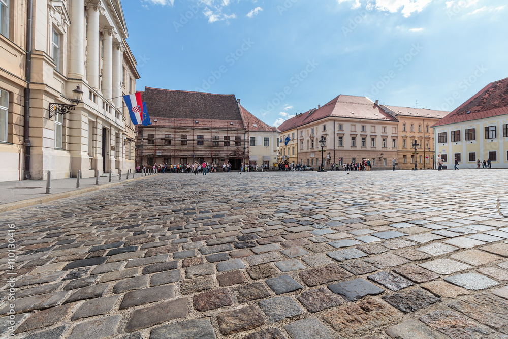 St' Mark's square with tourists in distance and Croatian Parliament building on the left