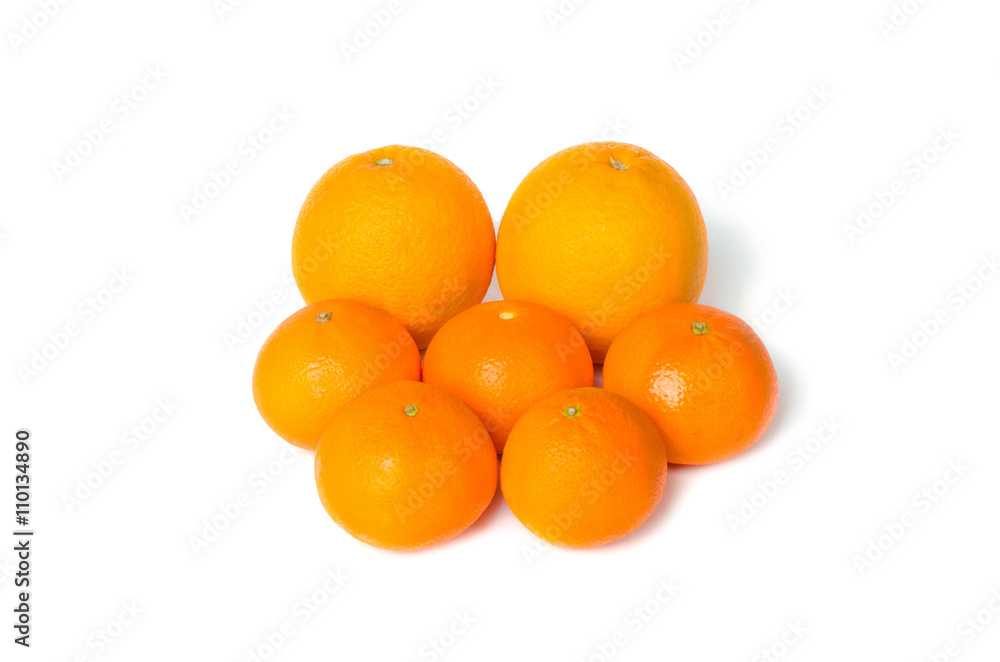 A heap of mixed citrus fruit including oranges and mandarines is A heap of mixed citrus fruit including oranges and mandarines is