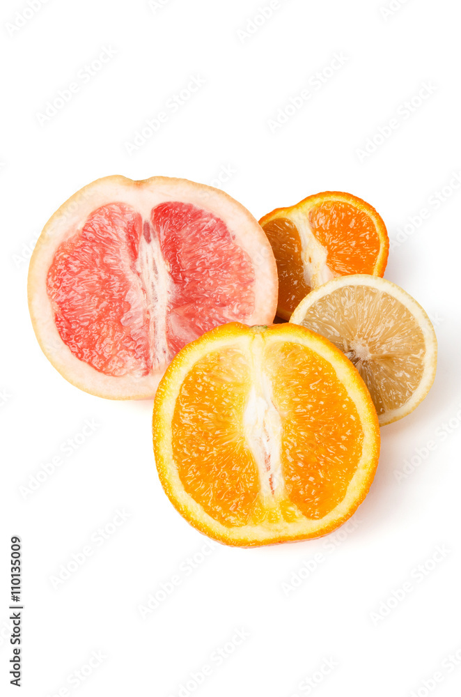 Halfes of grapefruit, orange, lemon and mandarin isolated on white Halfes of grapefruit, orange, lemon and mandarin isolated on white