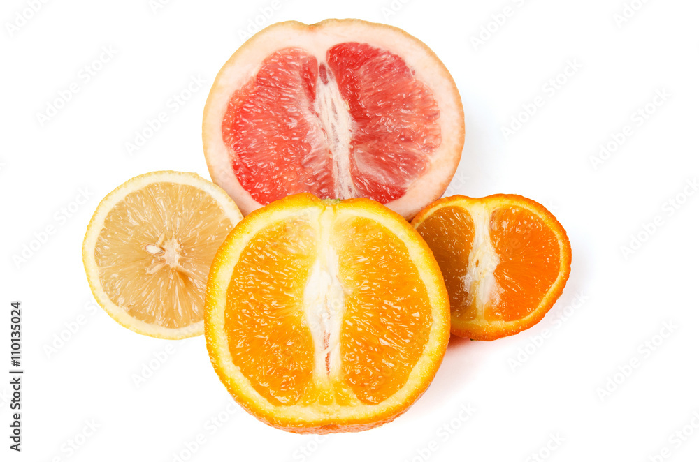 Halfes of grapefruit, orange, lemon and mandarin isolated on white Halfes of grapefruit, orange, lemon and mandarin isolated on white