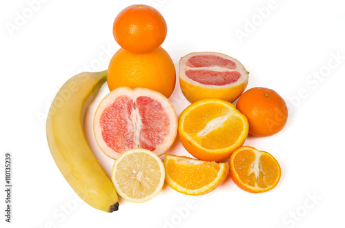 Grapefruits  oranges  kiwi  banana  mandarin and lemon isolated on white