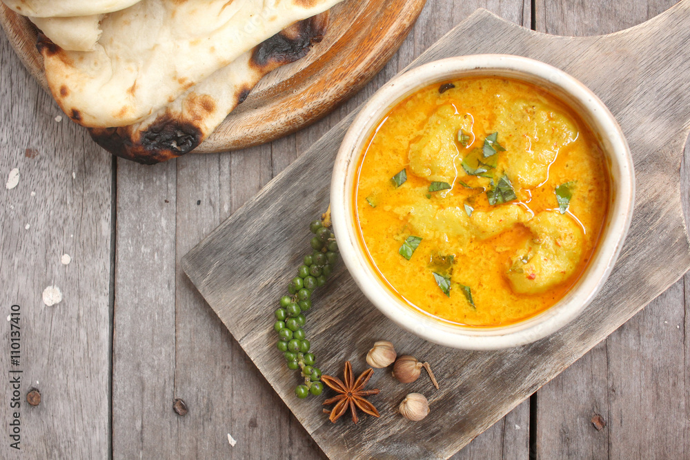 Indian naan bread with curry Indian naan bread with curry