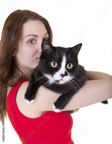 beautiful girl with cat on white background in Studio