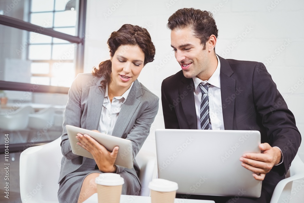 Fotografie Business people with technology