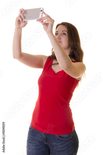 beautiful girl with phone on white background in Studio