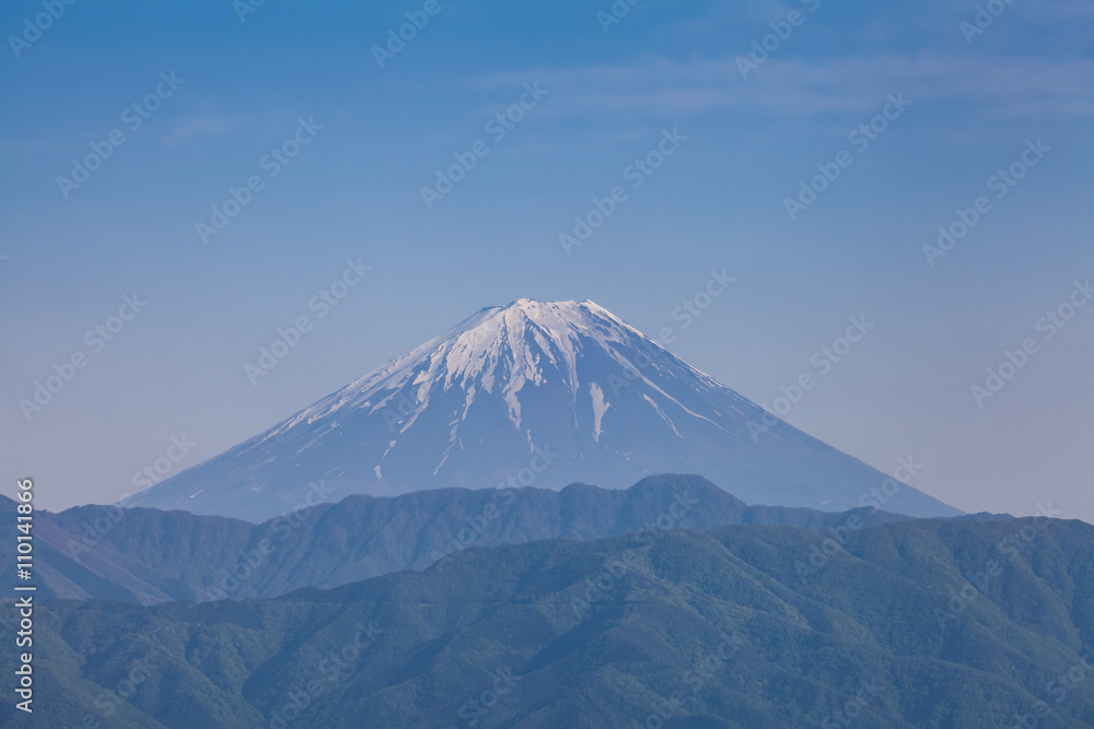Fototapeta premium Top of Mt. Fuji in spring seen from Kofu city