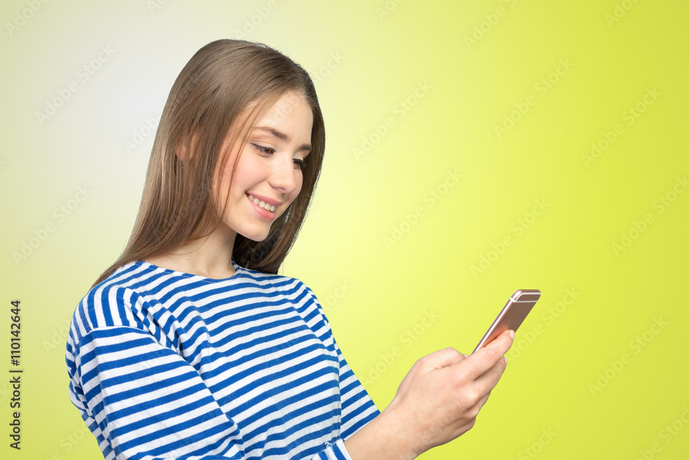 Beautiful woman texting on her cell phone Beautiful woman texting on her cell phone