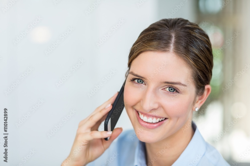 Portrait of woman talking on mobile phone Portrait of woman talking on mobile phone