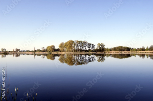 Cloudless sky over the lake