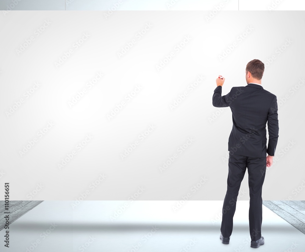 Composite image of business man writing with chalk Composite image of business man writing with chalk