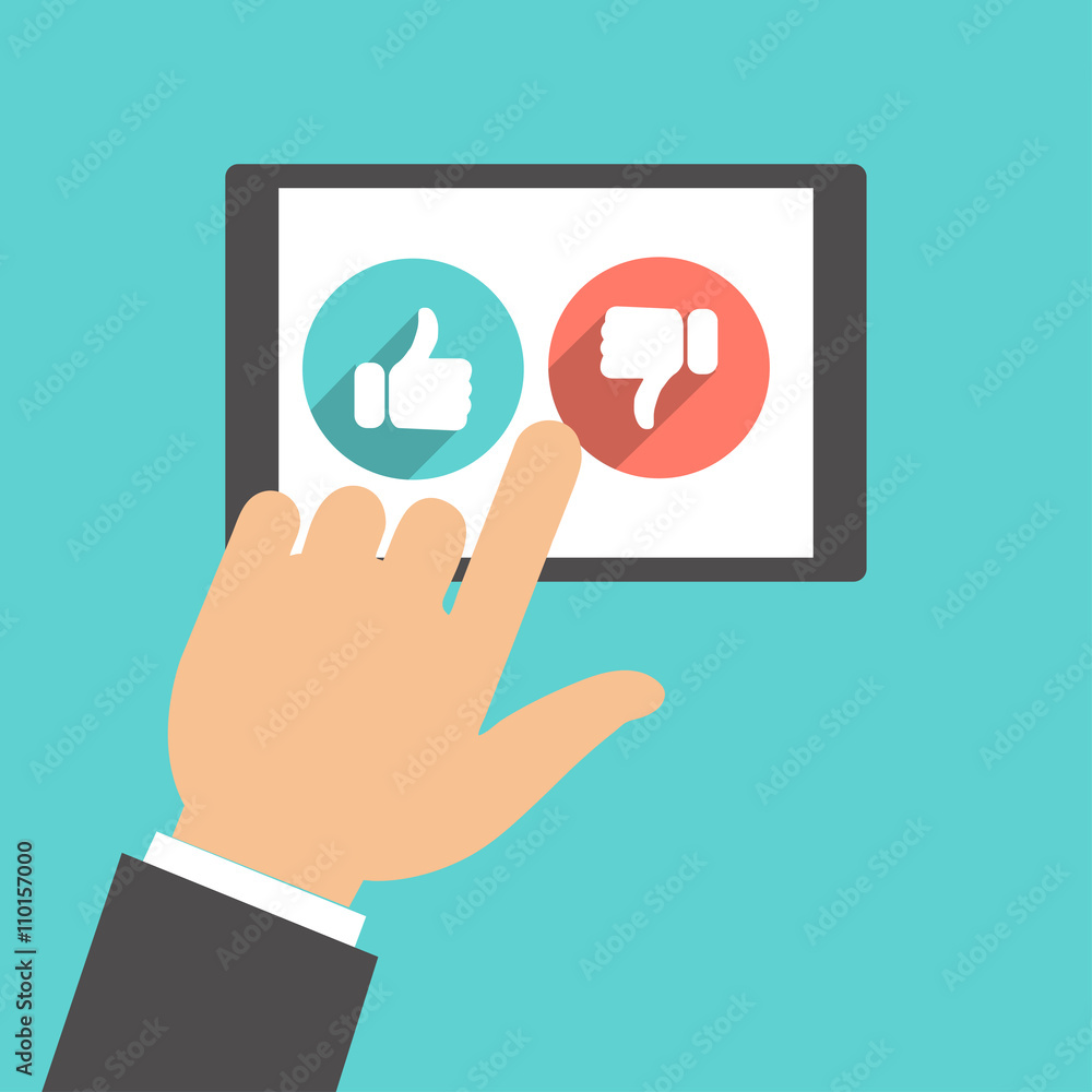 Hand and indicates the tablets like and dislike button hand sign on the screen Hand and indicates the tablets like and dislike button hand sign on the screen