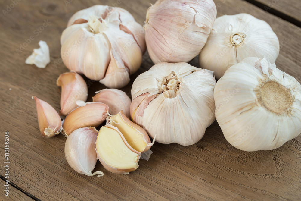 Fresh Garlic on the Wooden Table. Selective focus Fresh Garlic on the Wooden Table. Selective focus