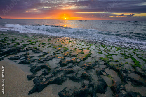 Sunset on the North shore beach, Oahu island, Hawaii.