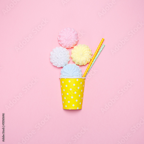 Vanilla desert on a pink background. Minimal style