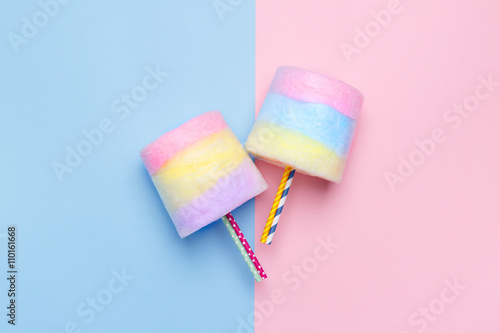 Minimal style. Multicolored Cotton candy. Pastel blue and pink background