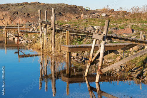 Small harbour in a bay with...
