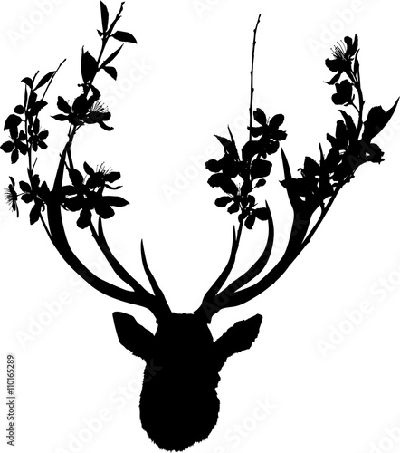 black deer head with blossoming branches between antlers