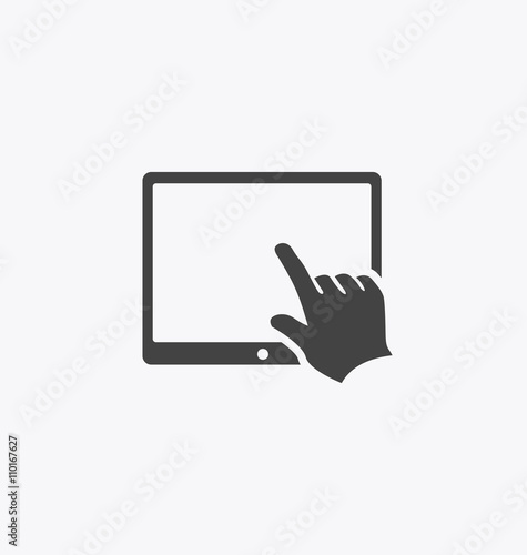 Finger touching tablet screen.