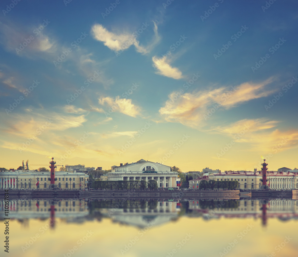 Classic view of Saint-Petersburg river scape at sunset. Basil Island in St Petersburg, Russia. Vintage style background.