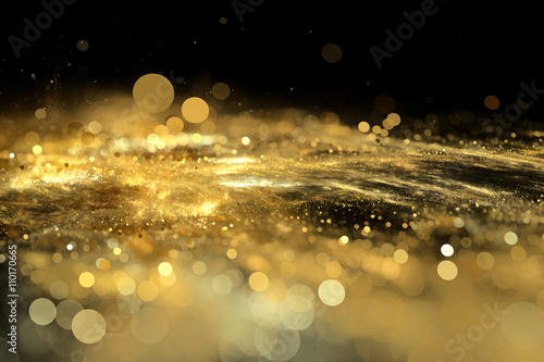 Abstract background gold bokeh circles. Beautiful background with confetti particles.