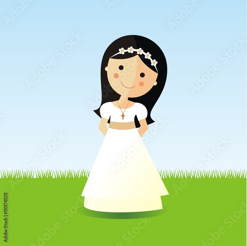 Primera comunión. Niña con un vestido blanco sobre un fondo de jardín