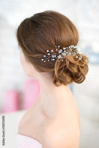 Beauty wedding hairstyle. Bride. Beautiful hairstyle rear view.