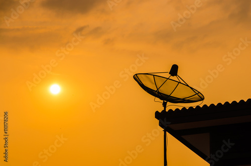 Silhouette of Satellite on roof