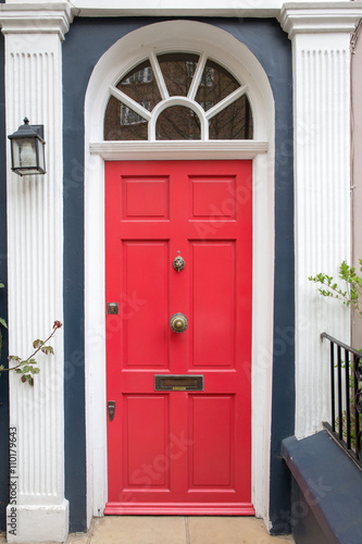 Red door in typical London house © cre250