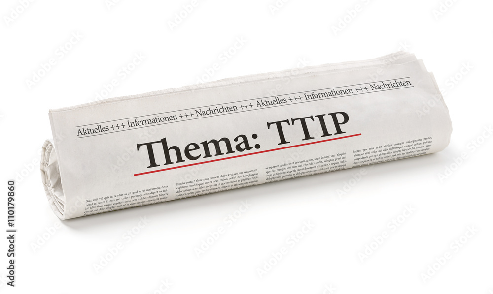 Zeitungsrolle mit der Überschrift Thema TTIP Zeitungsrolle mit der Überschrift Thema TTIP
