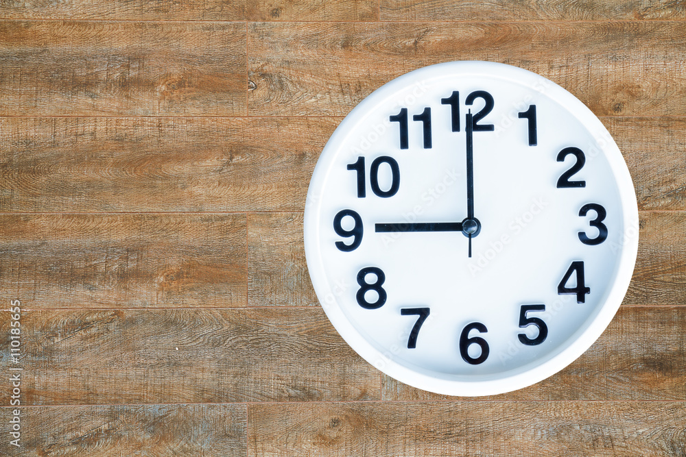Clock on wood background Clock on wood background