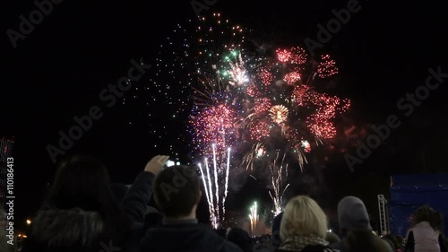 People look at fireworks