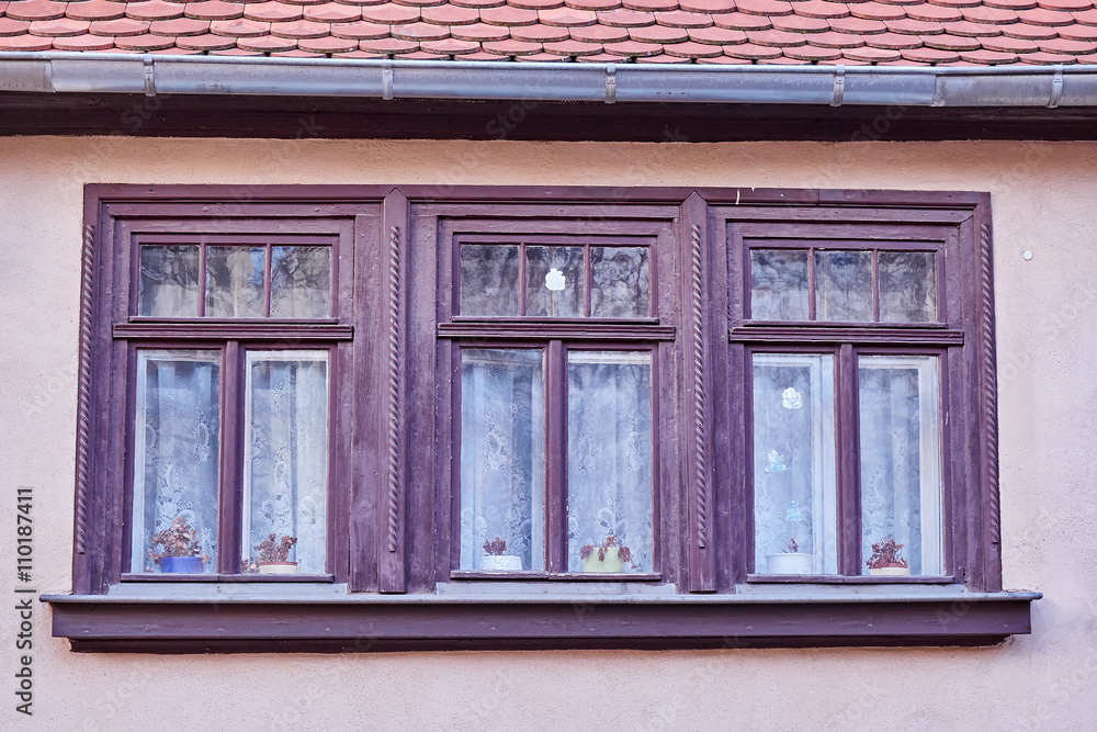 Fototapeta premium triple windows of an old vintage home