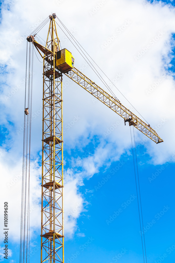 lifting tower crane on background the cloudy sky lifting tower crane on background the cloudy sky