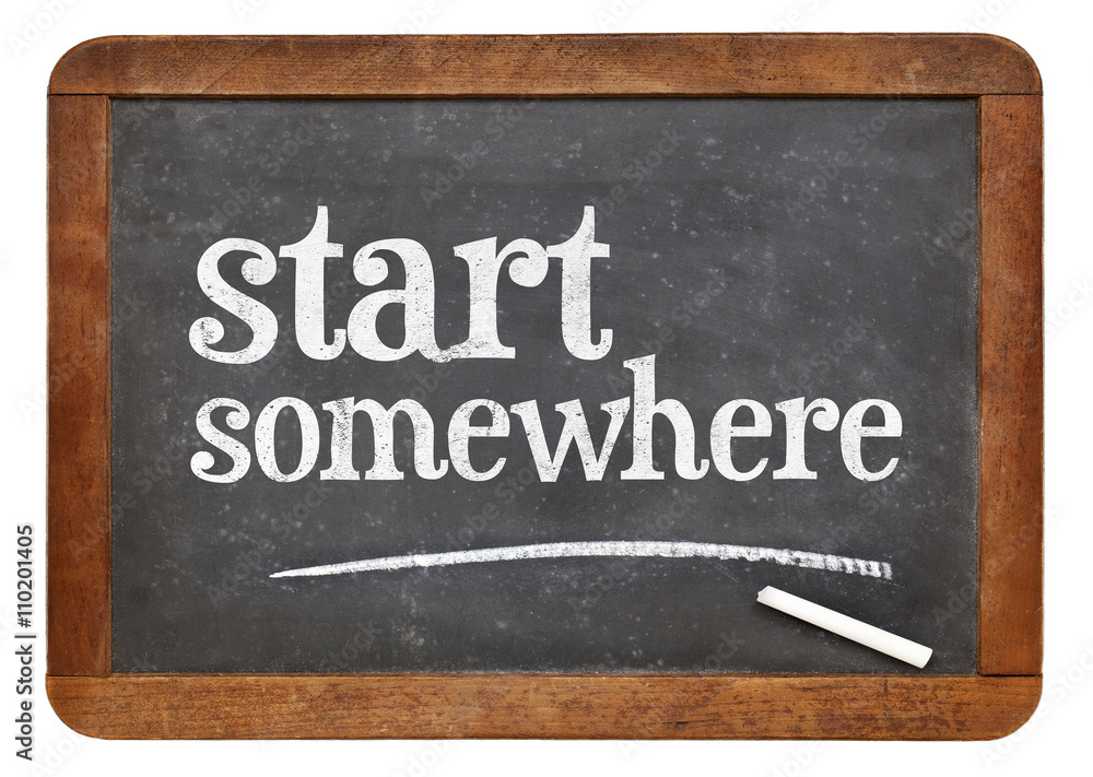 Obraz premium Start somewhere blackboard sign